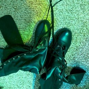 Black cosplay boots the lace all the way up and are pretty comfy